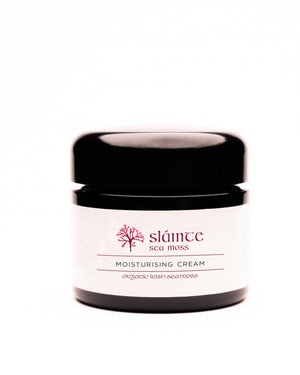 Jar of Slainte Sea Moss moisturizing cream on a white background