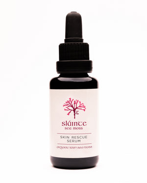 A bottle of Skin Rescue Serum by Sláinte, with a dropper, on a white background.
